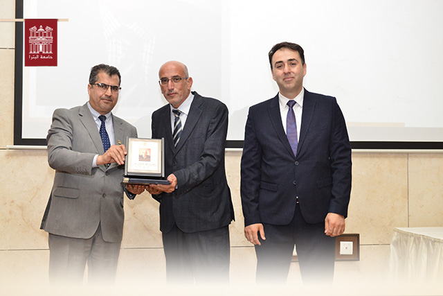 Honoring Dr. Yasser Al-Hamshari the Distinguished Researcher Award in the Department of Financial and Banking Sciences at the University of Petra for the Year 2023