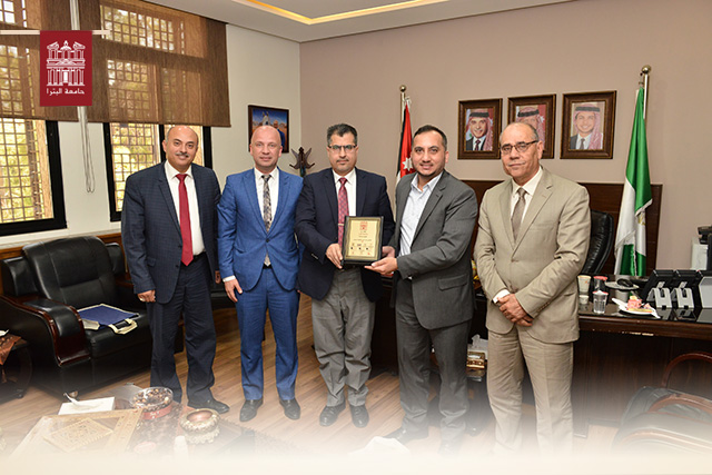 UOP President Honors University Alumnus and Journalist Al-Talafha